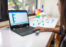 Girl coding mini robot ball with a laptop.