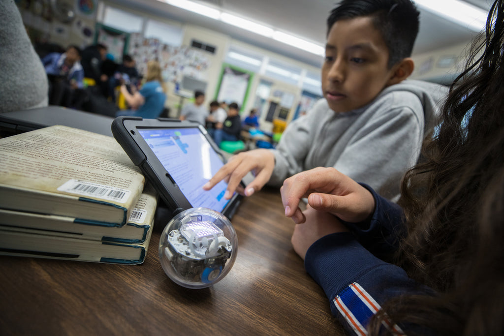 Kids learn coding concepts with Sphero programmable robots in school and at home.