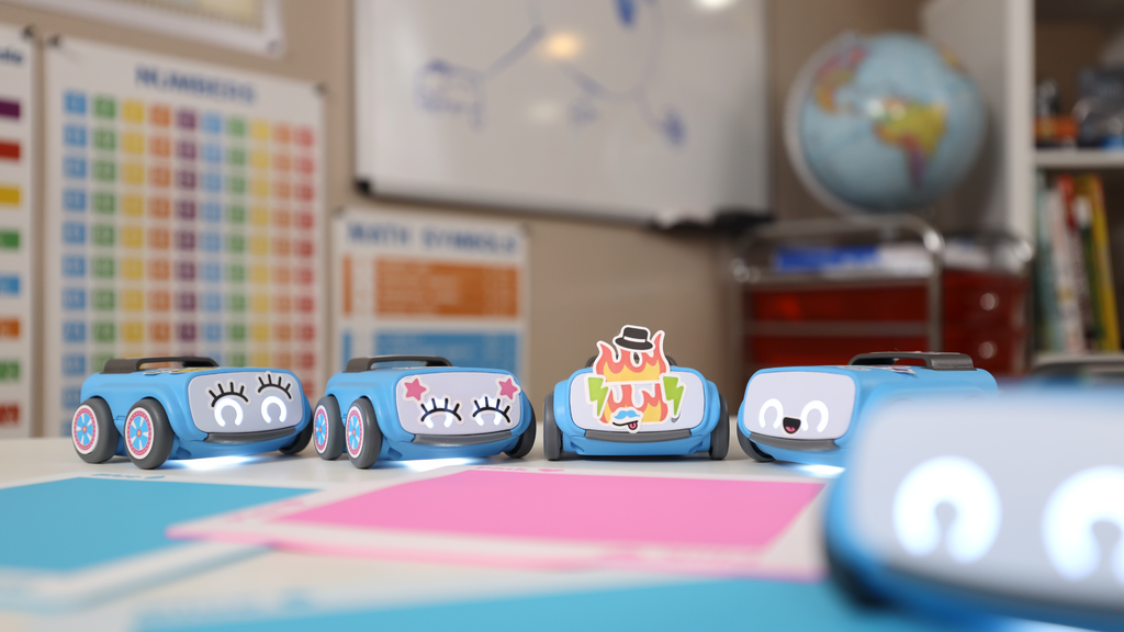 Several Sphero indis with personalized stickers on them.