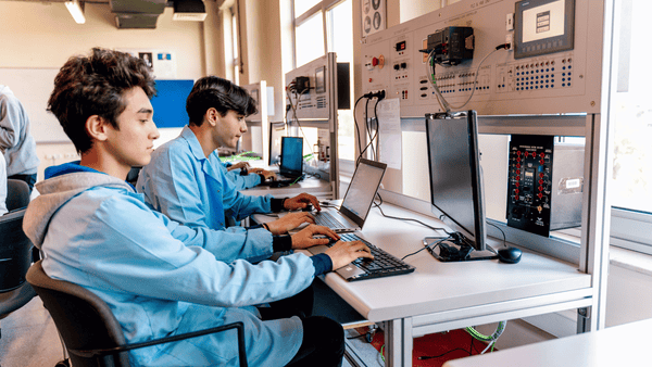 Students working at computers in a CTE classroom.